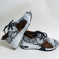 Women's casual sports shoes with suede upper, wedge heel, and round toe in multiple colour patterns