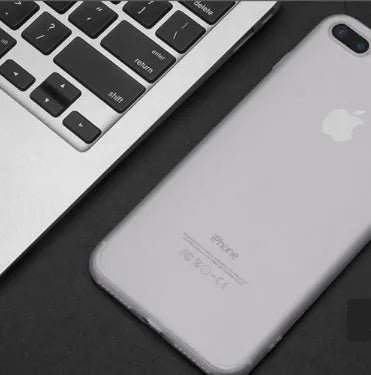A black TPU silicone mobile phone shell for an iPhone model, showing its flexible form.