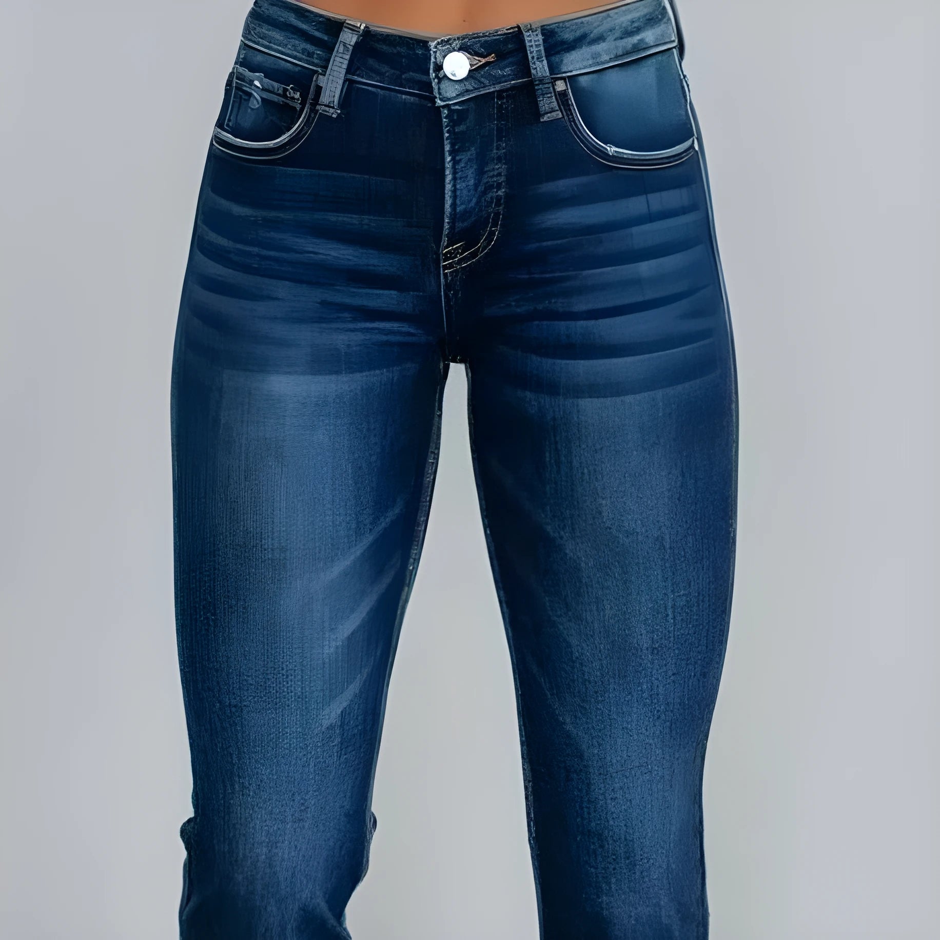 Solid colour women's denim trousers with hand-worn distressing on a hanger.
