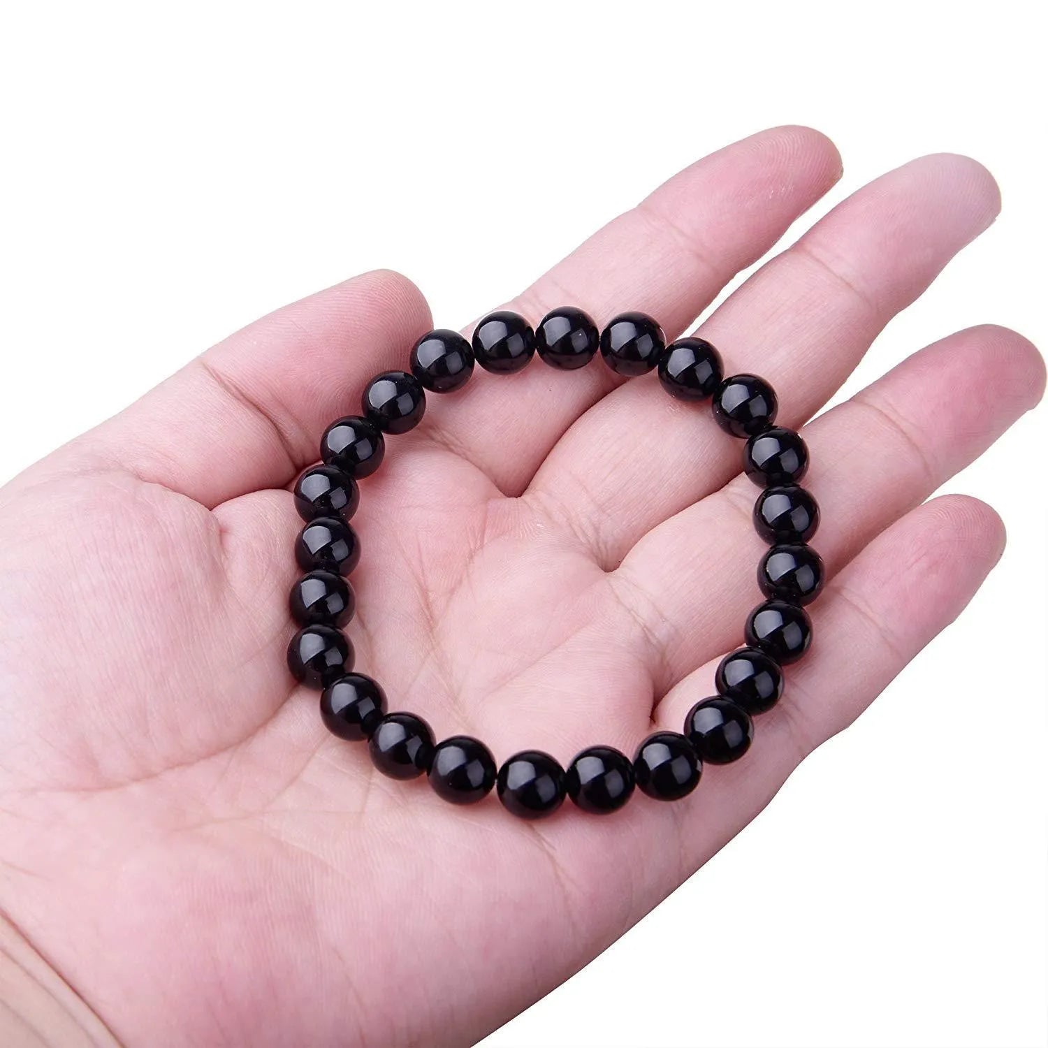 Geometric black agate bracelet with 8mm beads on a black elastic cord for women.