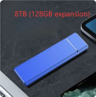 Sapphire blue metal portable solid state external hard drive with USB cable on a white background.