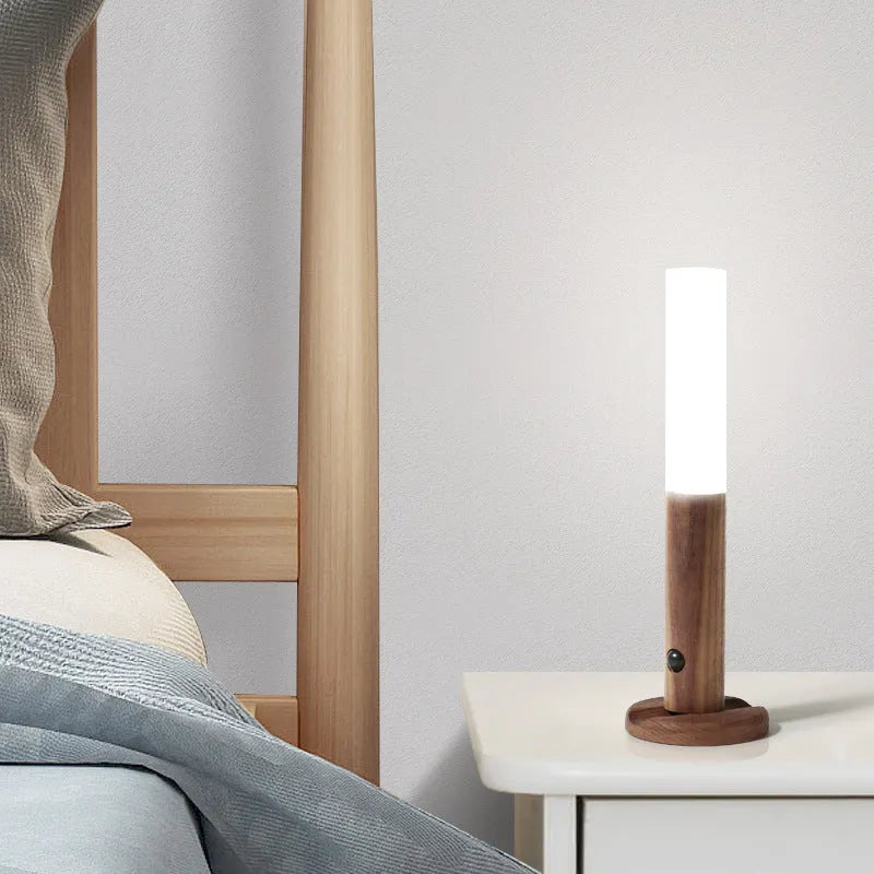 Compact smart sensor LED desk lamp with solid wood base and organic glass panel in coffee colour.