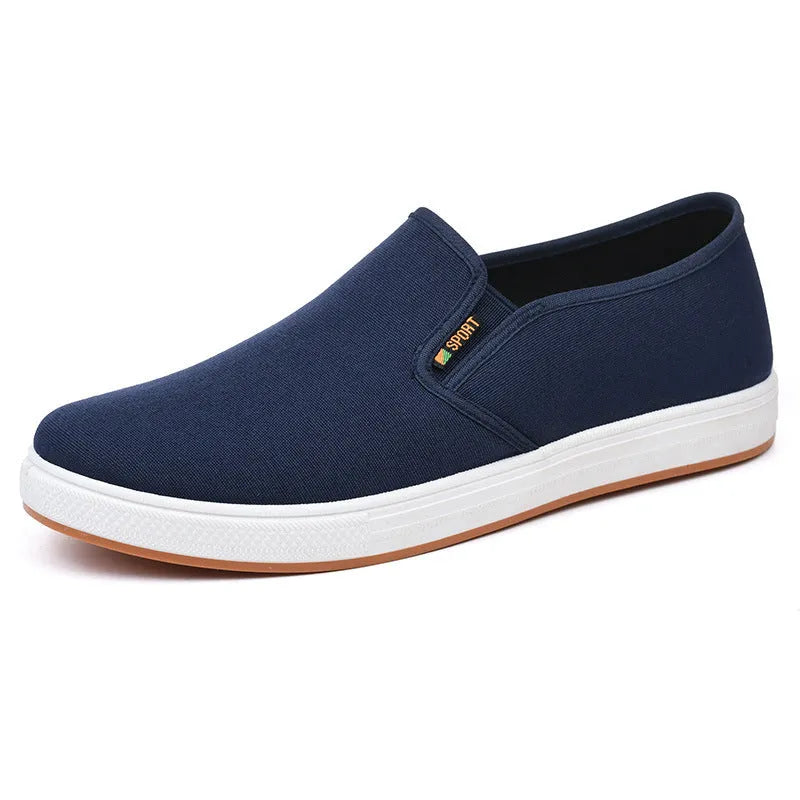 Men's black slip-on canvas cloth shoes with round toe and injection moulded sole