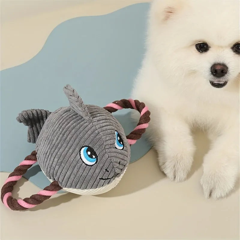 Turtle shaped plush dog toy with knotted rope limbs and squeaker in grey green orange colours