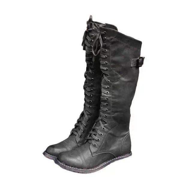 Women's black high leg chunky heel casual boots on a white background