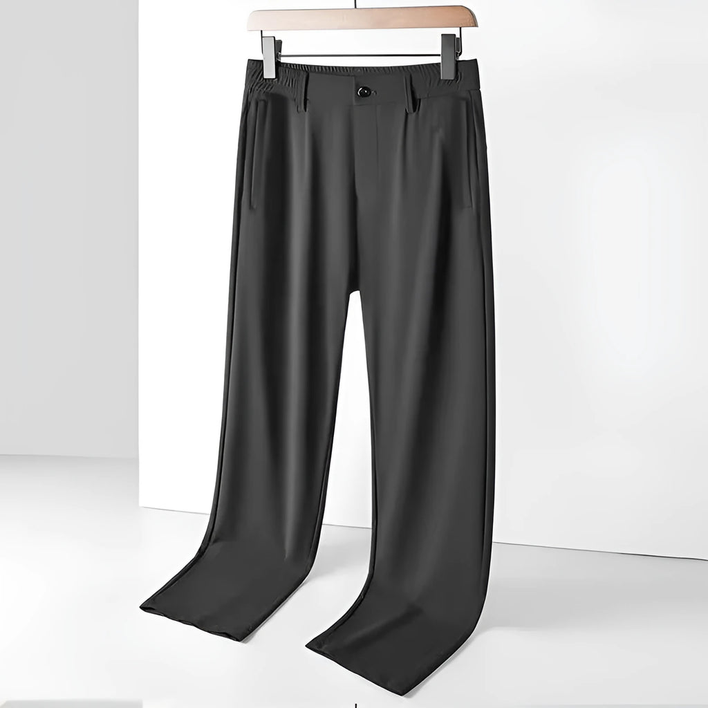 Men's loose-fit ice silk trousers in black, shown flat, highlighting the elastic waistband and straight leg.