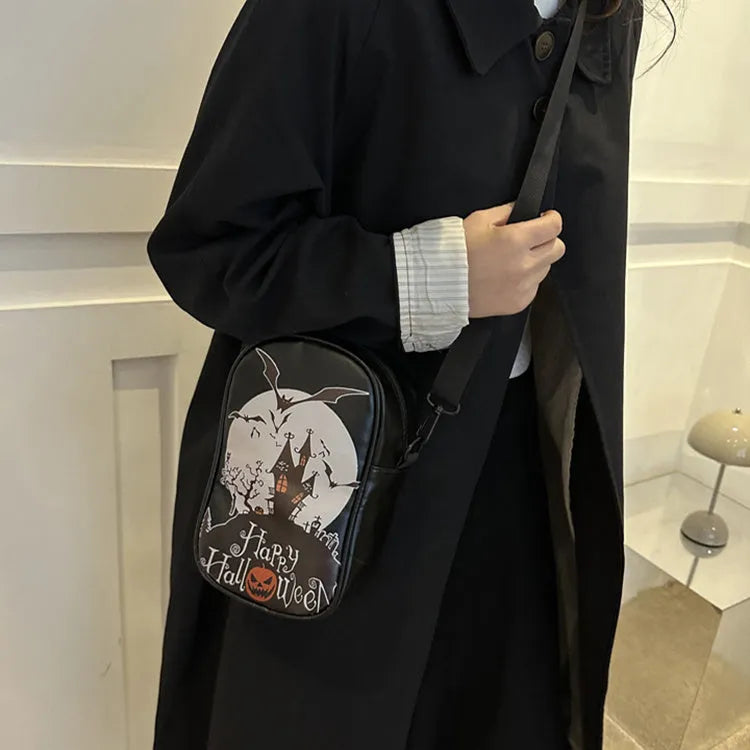 Halloween graffiti crossbody bag with pumpkin ghost bat print in black colour
