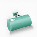 Universal portable power bank in black, green, pink, or white with 3000 mA capacity for Android and Apple phones.