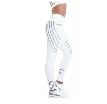Women's black printed Milk Silk workout leggings with a slim fit, shown from the side.