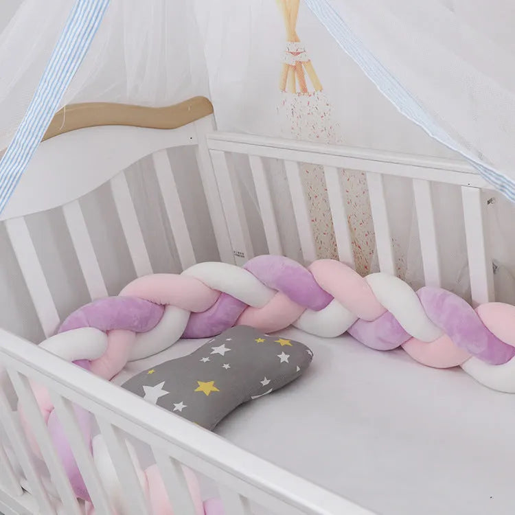 Baby crib bumper in crystal velvet with braid knot design showing flexible length options for cot protection