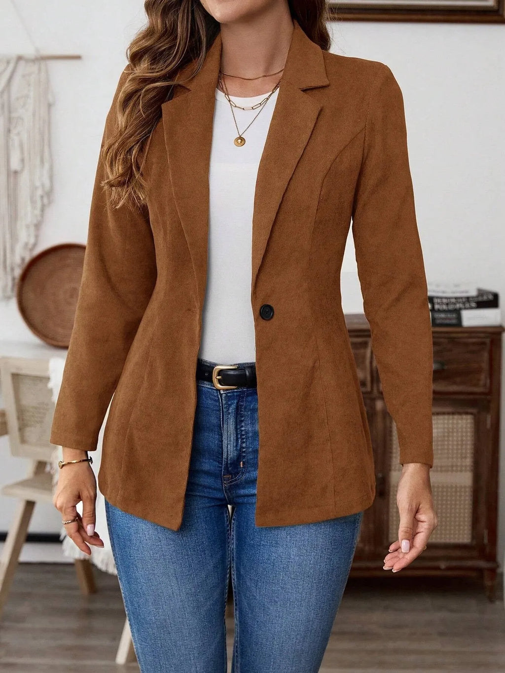 Brown men's single-breasted leisure suit coat with lapel and long sleeves.