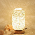 Brown hemp rope Sepak Takraw desk lamp on wooden base with woven sphere design