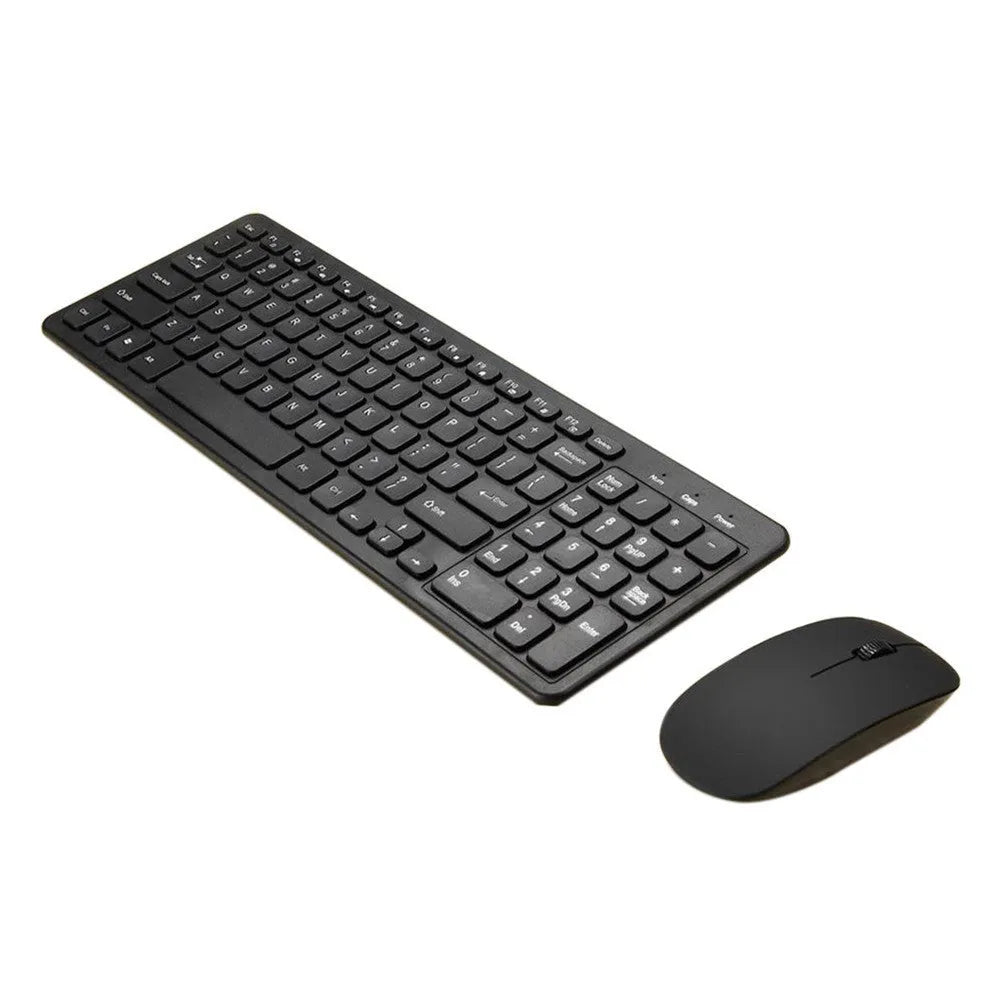Black wireless keyboard and mouse set with USB receiver on wooden desk