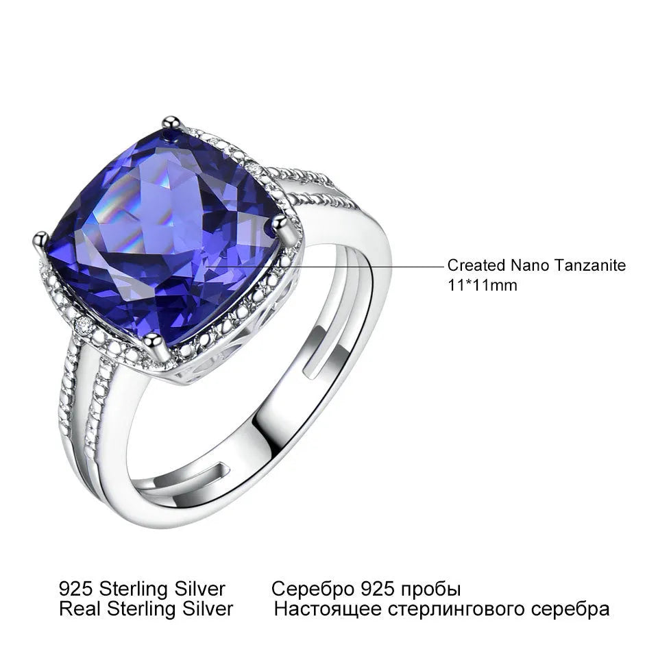 Close-up of a blue Tanzanite stone set in a polished 925 Sterling Silver women's ring.