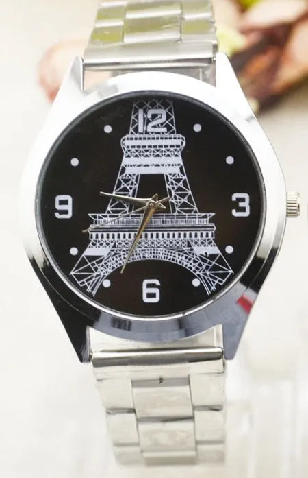 Eiffel Tower analogue wrist watch with stainless steel case, shown in men's and women's styles.