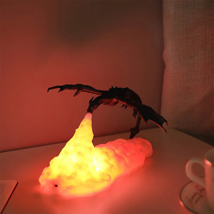3D printed red dragon lamp lit up with warm glow on a dark surface