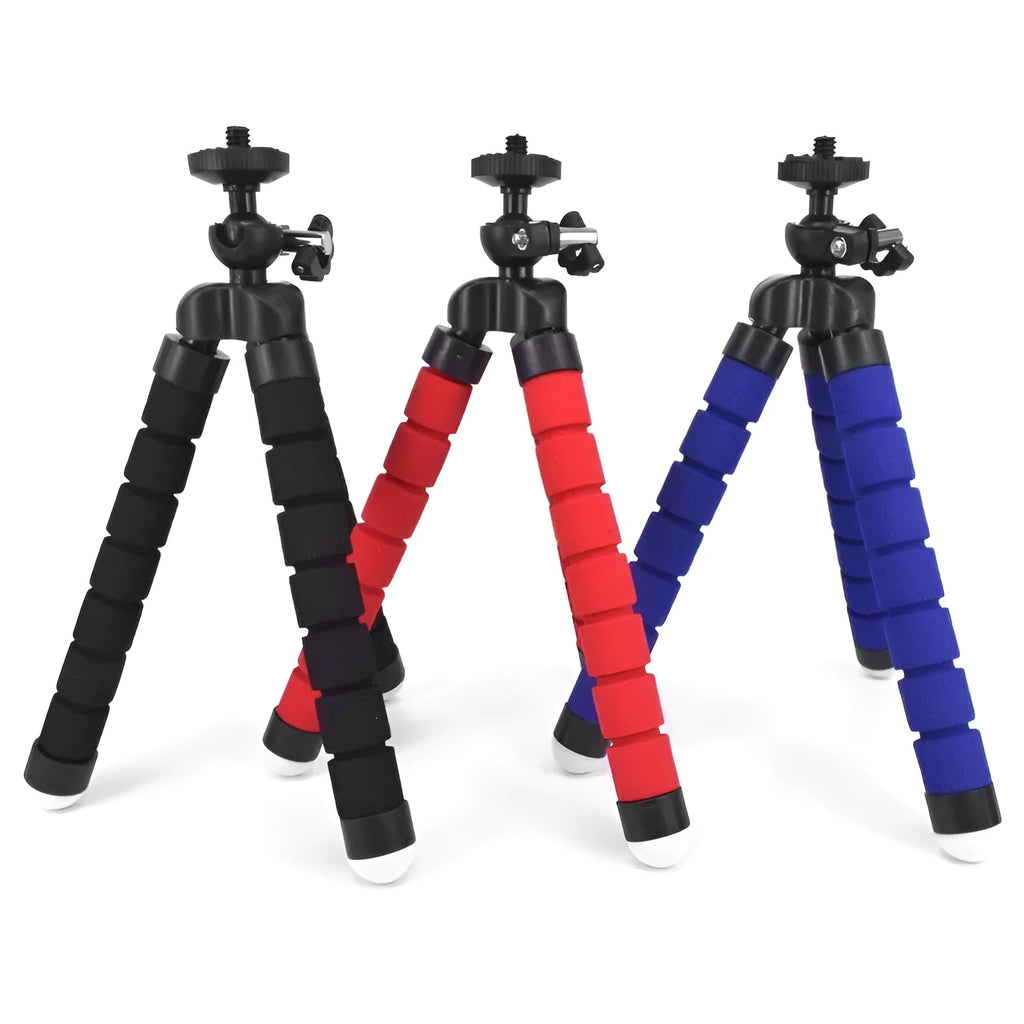 Black mini flexible octopus tripod with wrapped legs next to a smartphone.