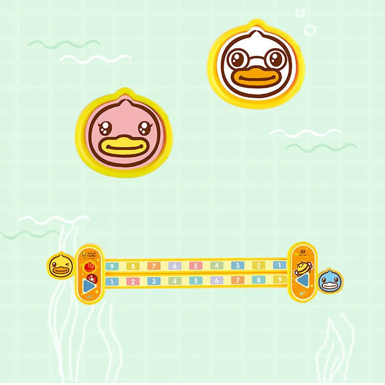 A yellow plastic children's cartoon digital decomposition ruler showing measurements up to 24.5 cm.
