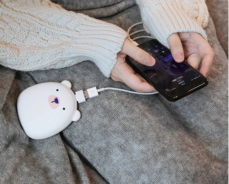 Cartoon penguin and polar bear USB rechargeable electric hand warmer showing dimensions