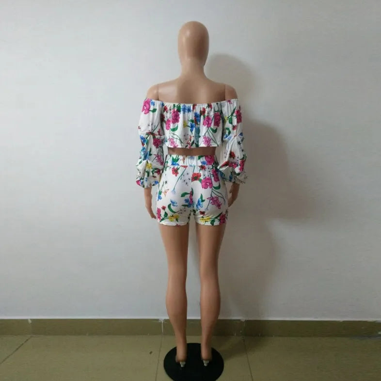 Women's two-piece outfit with digital printing pattern showing long sleeve top with pile sleeves and matching shorts