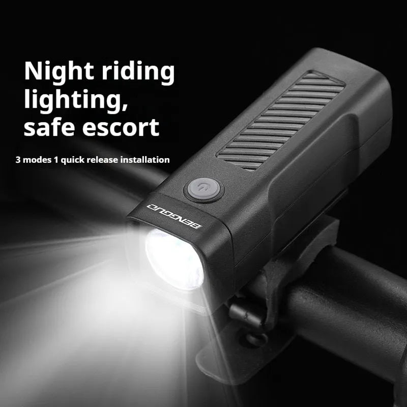Bicycle headlight with LED light source and quick release strap bracket for handlebar mounting