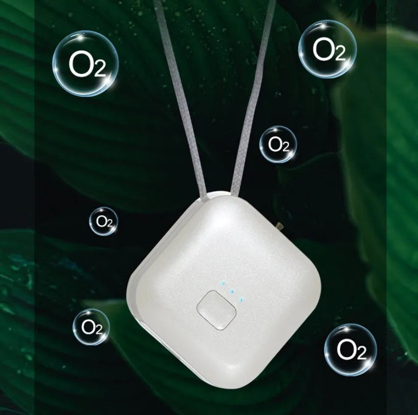 Mini USB air purifier necklace in blue, showing compact rectangular design on a lanyard.
