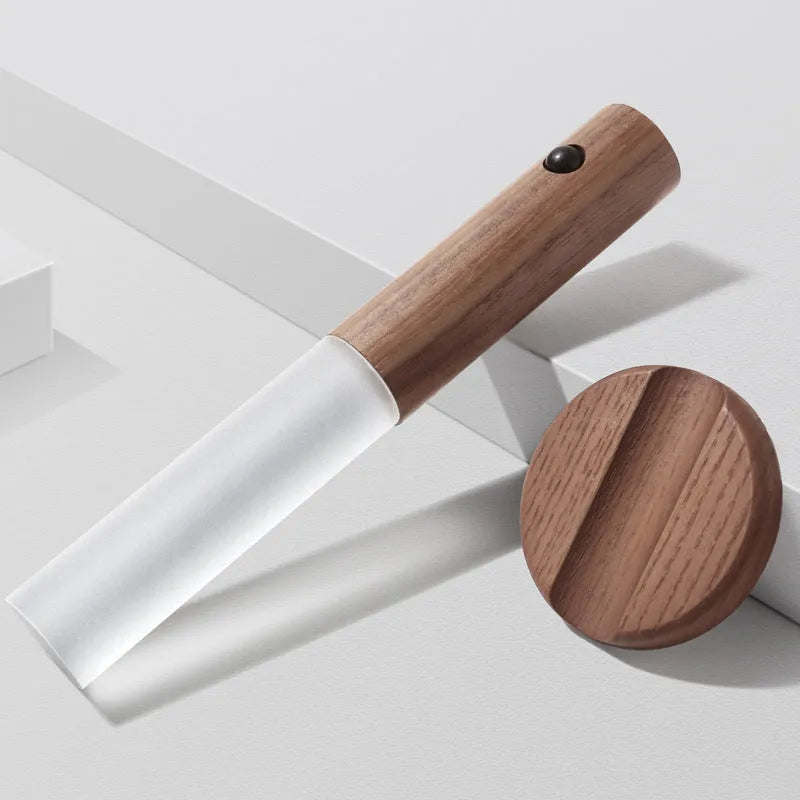 Compact smart sensor LED desk lamp with solid wood base and organic glass panel in coffee colour.