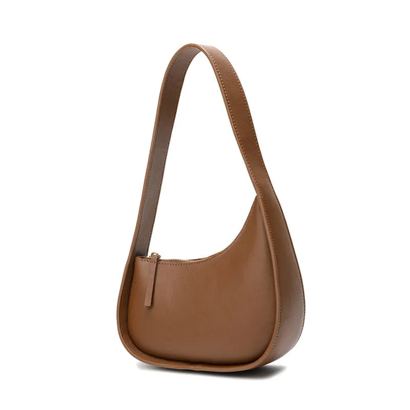 Women's genuine leather half-moon shoulder handbag with wide strap in caramel colour