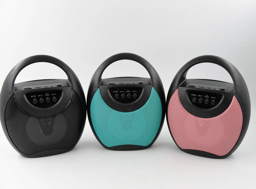 Portable Bluetooth speaker in black, blue, or pink with USB port and playback controls