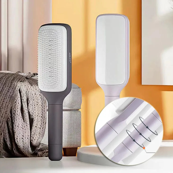 Self-cleaning hairbrush with rotating handle in Roland purple colour showing anti-static teeth and massage comb function