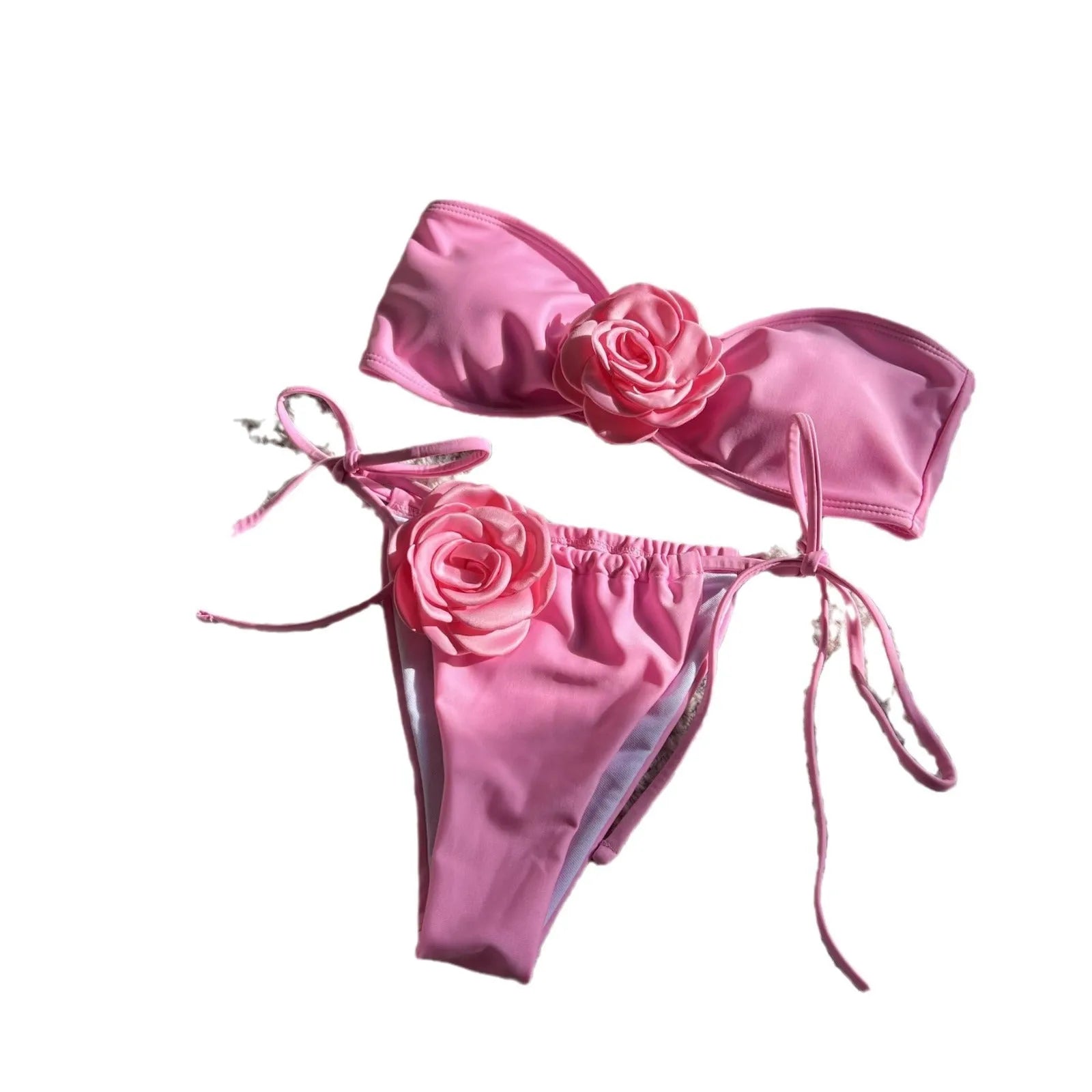 Women's solid colour tube top swimsuit with drawstring straps and briefs style bottom.