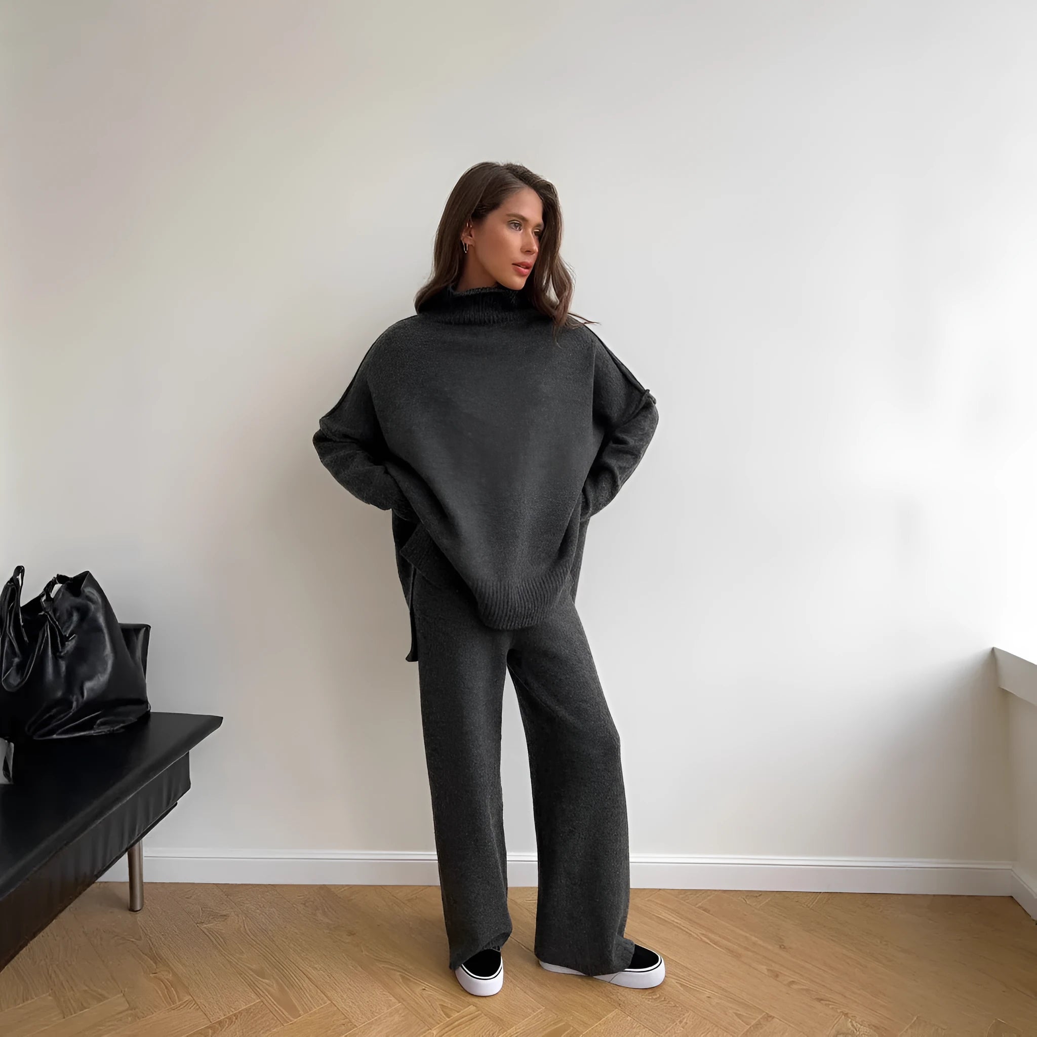 Women's acrylic two-piece suit with side-slit sweater top and matching trousers in dark grey