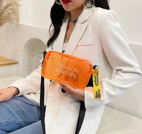 Transparent square jelly shoulder bag with adjustable strap in various colours on a white background.