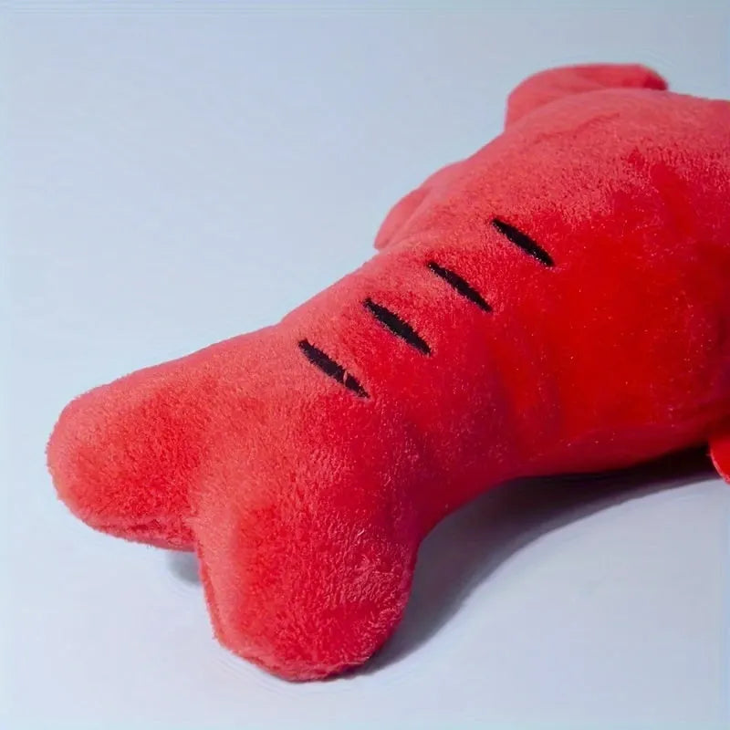 Red lobster shaped squeaky dog toy with crab claw details for small medium dogs