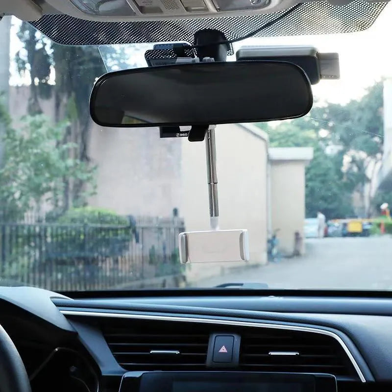 Black ABS plastic mobile phone bracket mounted on vehicle rearview mirror showing 18cm length option