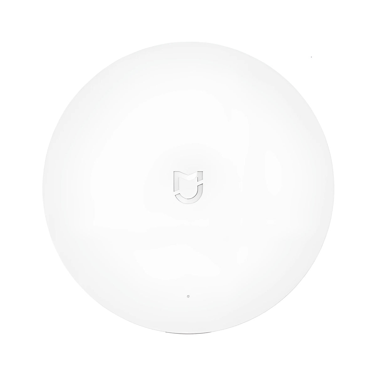 White circular Xiaomijia smart home gateway with UK plug for wireless remote control