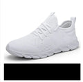 Men's black and white mesh sneakers with lace-up closure and PVC sole for casual jogging
