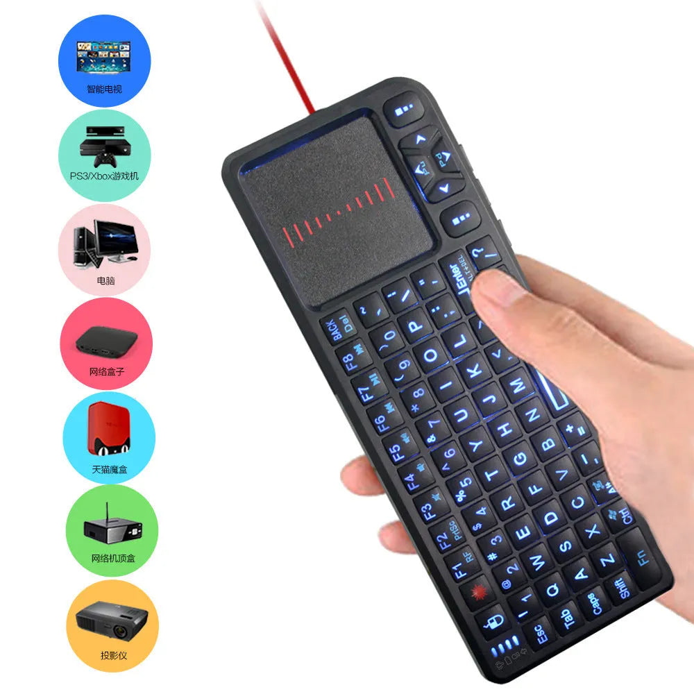 Black wireless laser teaching mini keyboard with touch screen showing backlit keys and compact design.