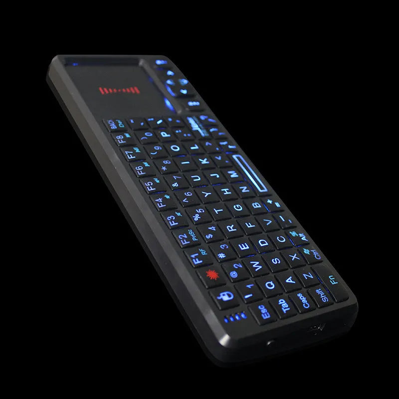 Black wireless laser teaching mini keyboard with touch screen showing backlit keys and compact design.