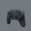 Black wireless Bluetooth gamepad controller for Nintendo Switch Lite on a colour box with USB cable.