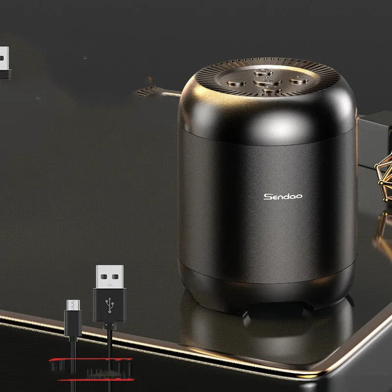 Small black or white portable Bluetooth speaker with a subwoofer, showing compact size.