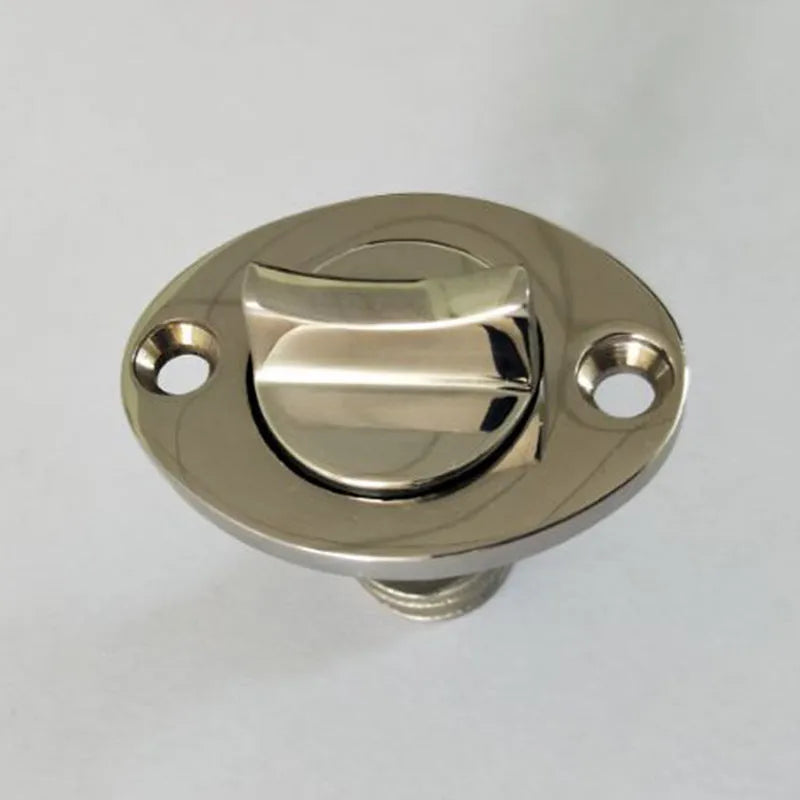 Stainless steel marine deck water plug with brass screw, shown next to a ruler for scale.