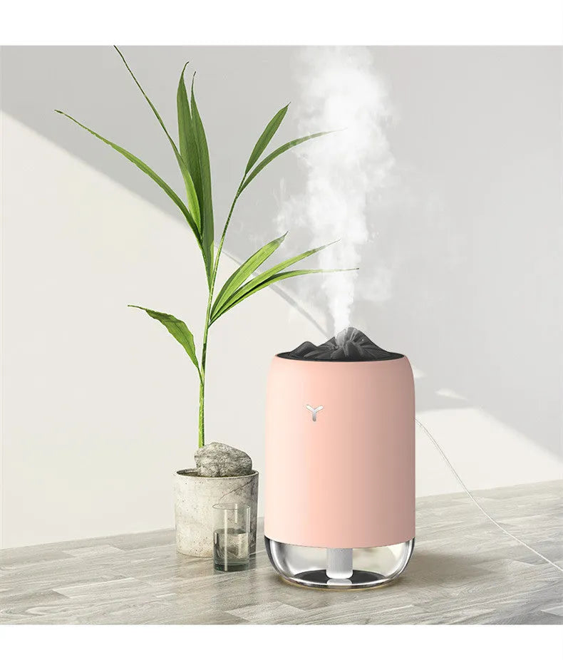Magic Flame columnar ultrasonic humidifier and essential oil diffuser in white, light blue, or pink