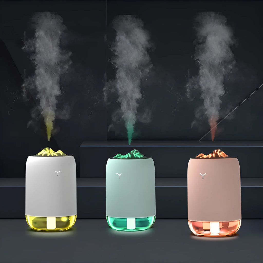 Magic Flame columnar ultrasonic humidifier and essential oil diffuser in white, light blue, or pink