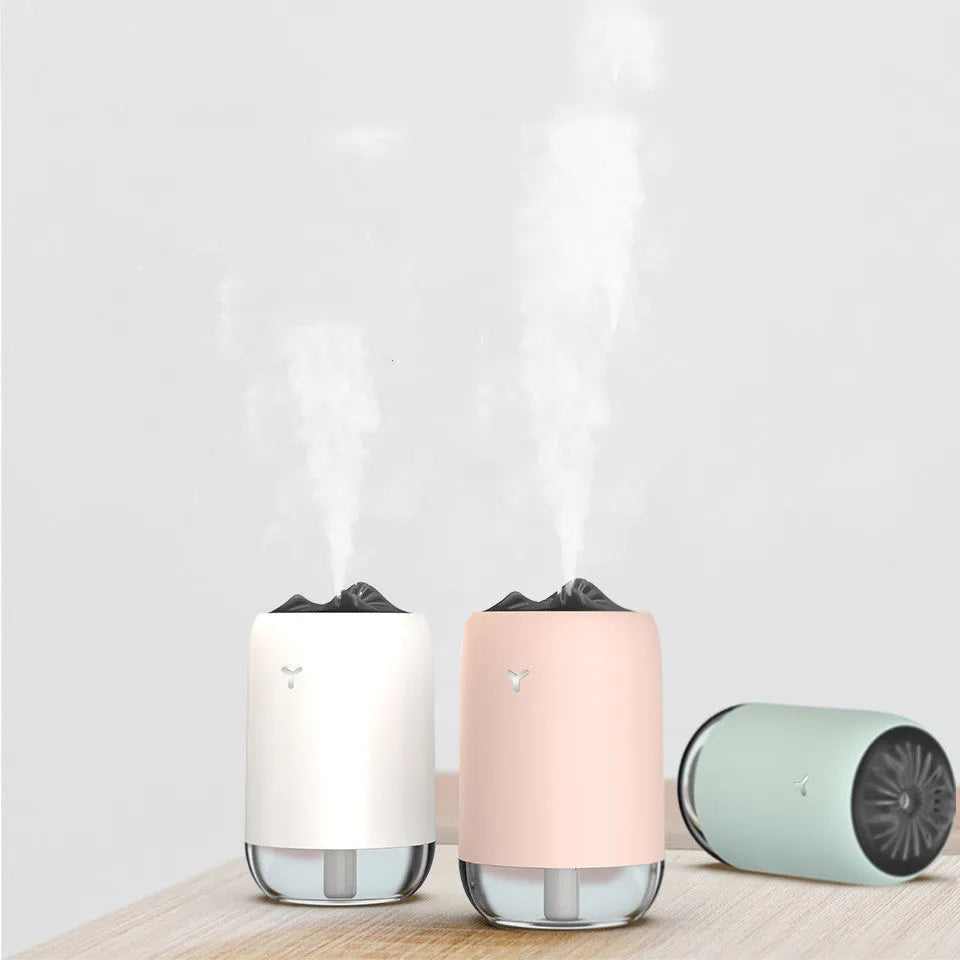 Magic Flame columnar ultrasonic humidifier and essential oil diffuser in white, light blue, or pink