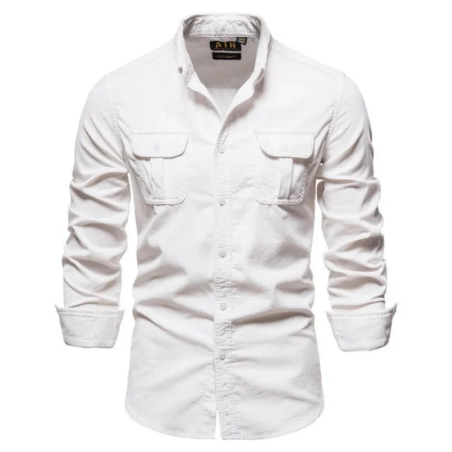 Men's denim blue long sleeve linen shirt laid flat, showing button front and long sleeves.