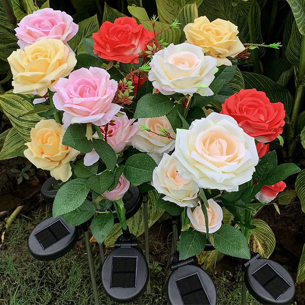 Three-headed solar rose garden lamp with white LED lights, standing 80cm tall with pink silk cloth petals on stainless steel stem