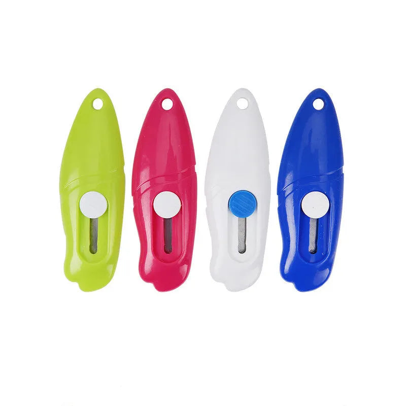 Cartoon art knife with open box design showing plastic and metal construction