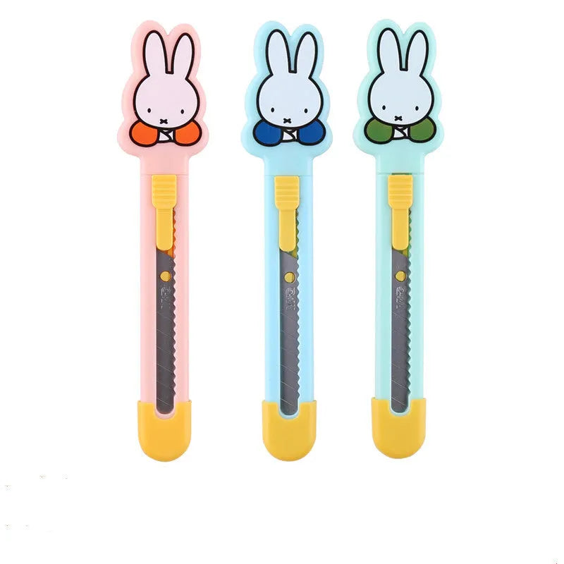 Cartoon art knife with open box design showing plastic and metal construction