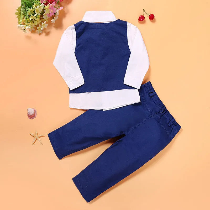 Boys blue casual suit set with vest, turtleneck, trousers, and tie on a hanger